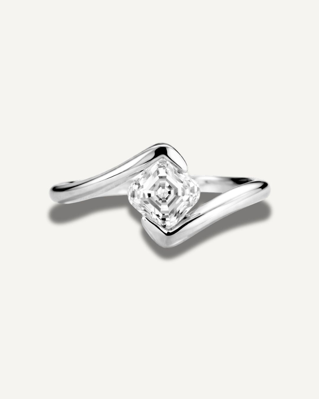 Silver tone wave band ring with asscher cut moissanite stone in a minimal geometric design