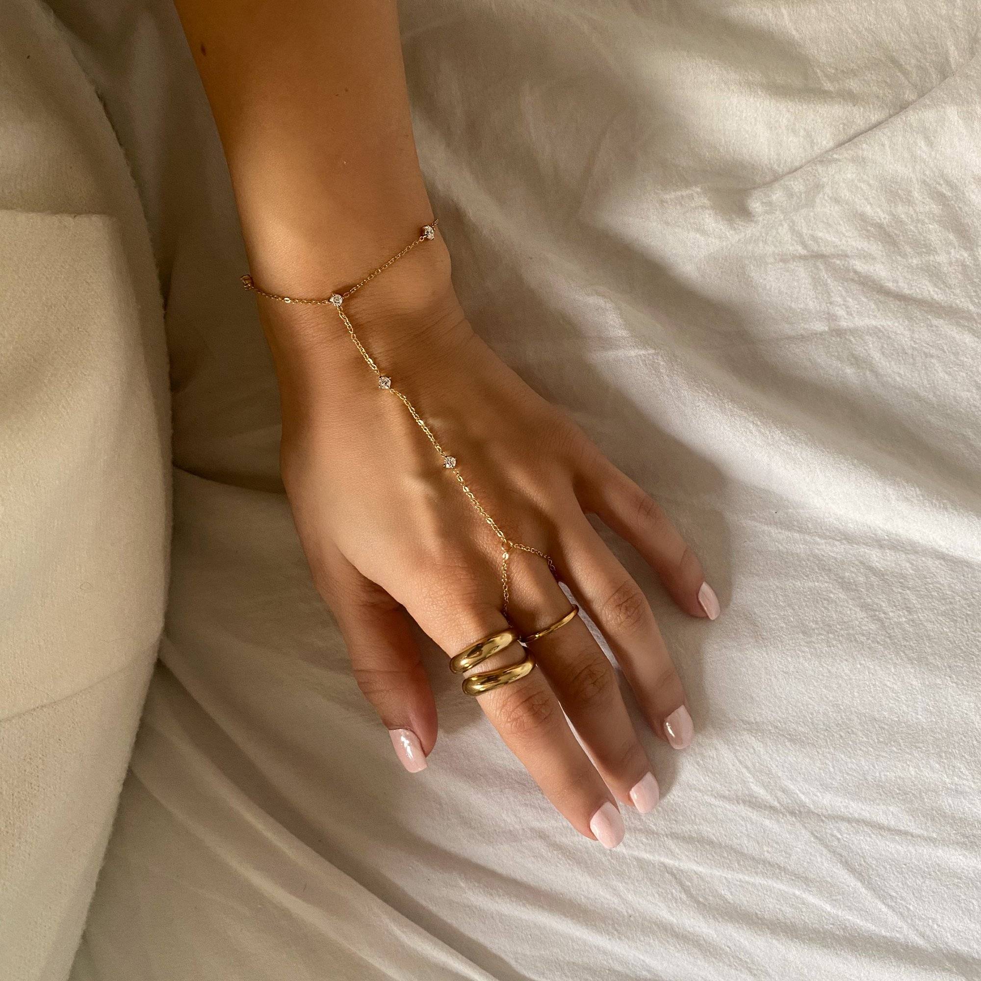 Side angle of KetsiyaB diamond hand chain bracelet by Kampy Designs, showing the graceful chainwork and diamond accents.