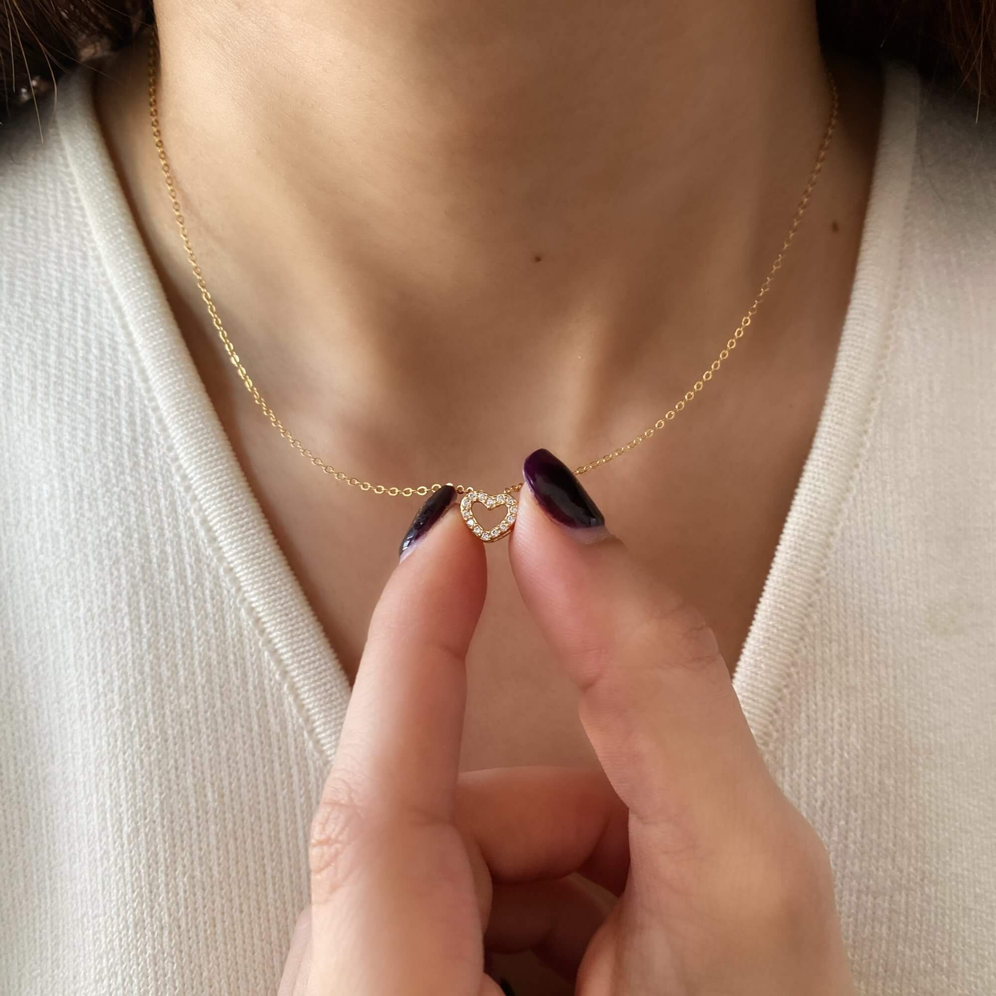 Close-up of the KaseyN diamond hollow heart pendant necklace by Kampy Designs, showcasing its elegant open-heart design with sparkling diamonds.