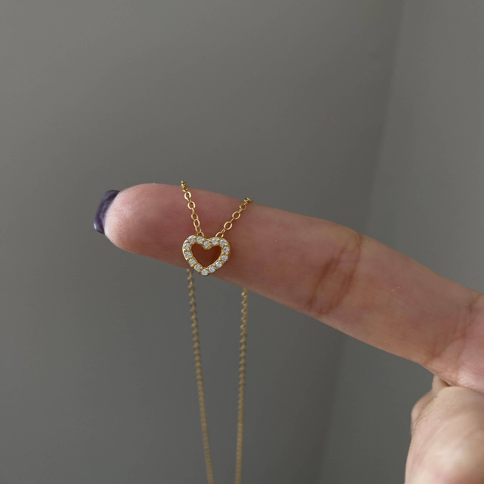 Front view of the KaseyN diamond hollow heart pendant necklace by Kampy Designs, featuring a delicate heart pendant with fine diamond embellishments.