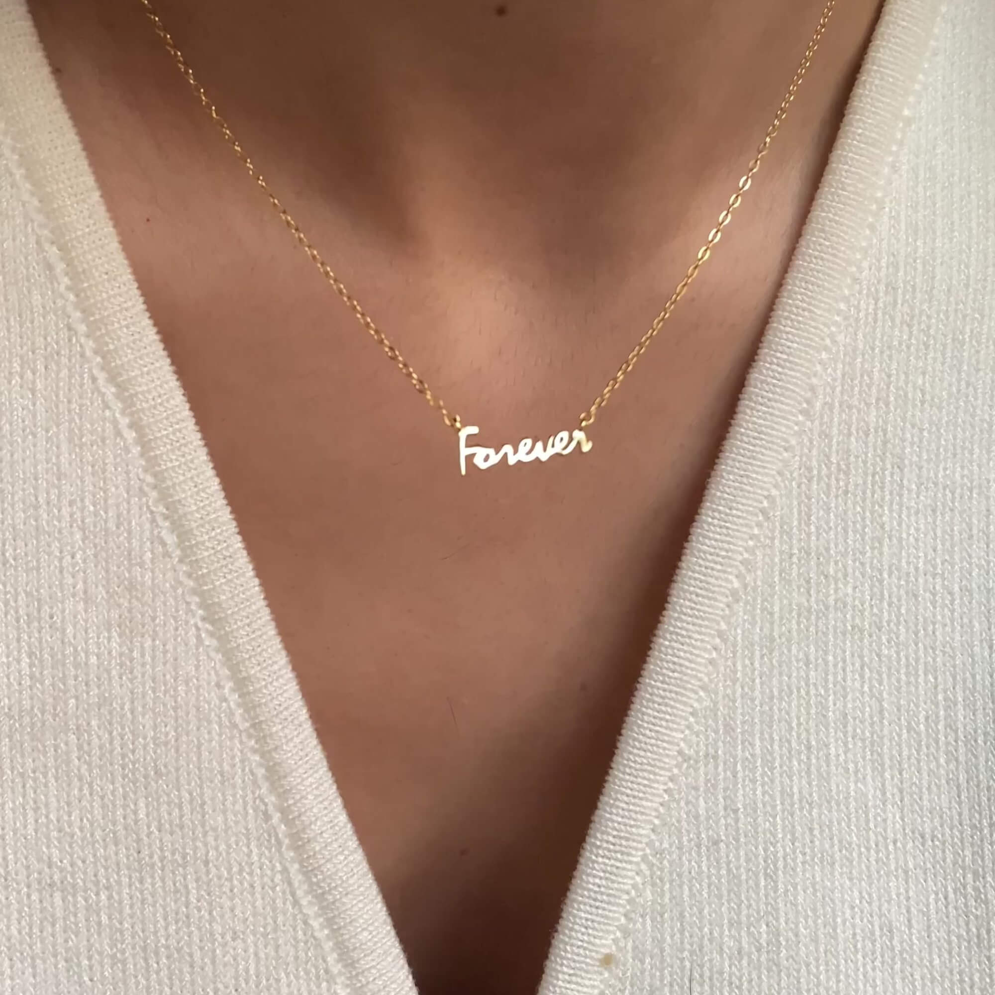 Side view of the KupidN forever pendant necklace by Kampy Designs, emphasizing its curved pendant design and premium gold finish.