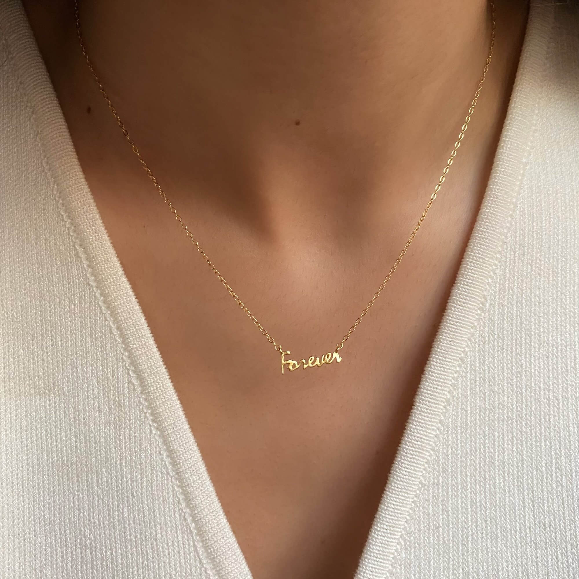 The KupidN forever pendant necklace by Kampy Designs, elegantly worn, showcasing its timeless infinity-inspired design and polished finish.