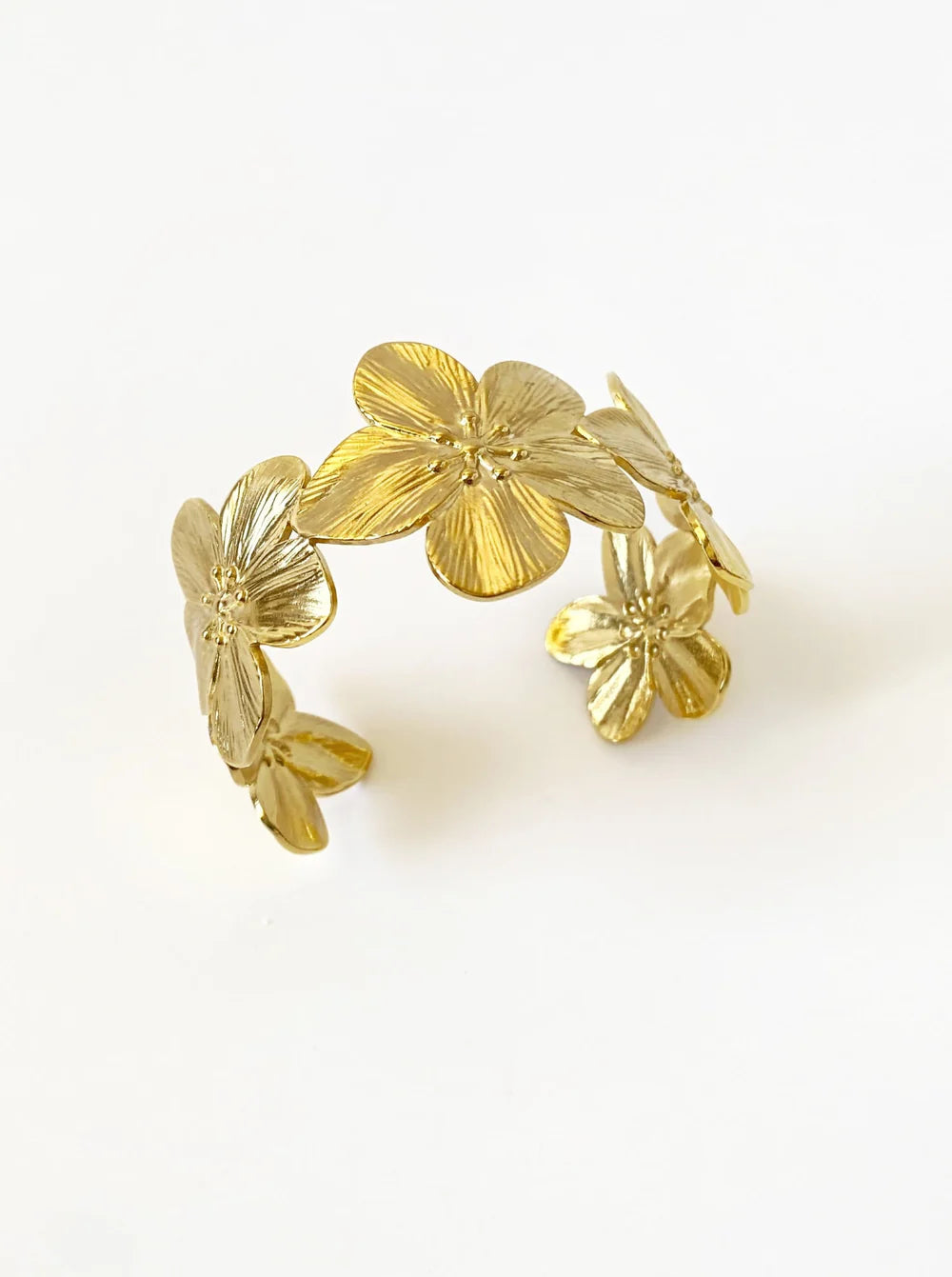 Front view of the KloraB hibiscus flower cuff bracelet by Kampy Designs, emphasizing its bold floral design and structured cuff shape.