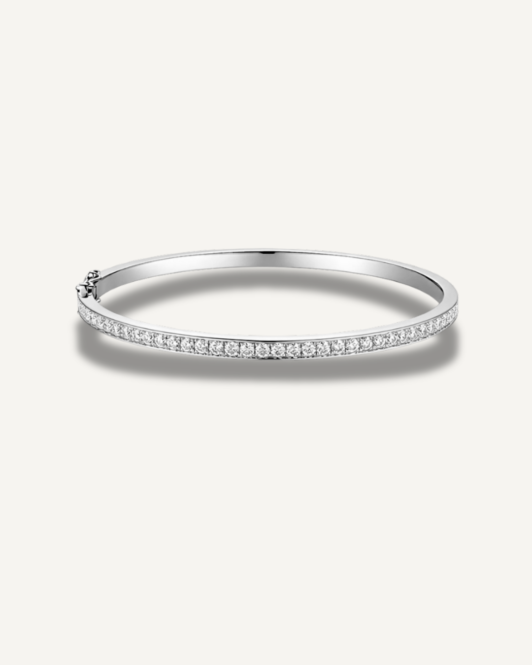 Lara white gold moissanite tennis eternity bangle with 2mm pavé stones set in 925 sterling silver, slim 3mm stacking bracelet design.