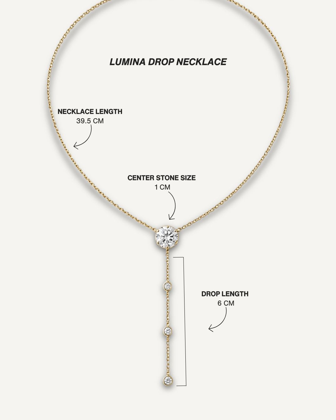 Lumina Drop Necklace size guide showing a 39.5 cm necklace length, 1 cm center stone and 6 cm lariat drop.