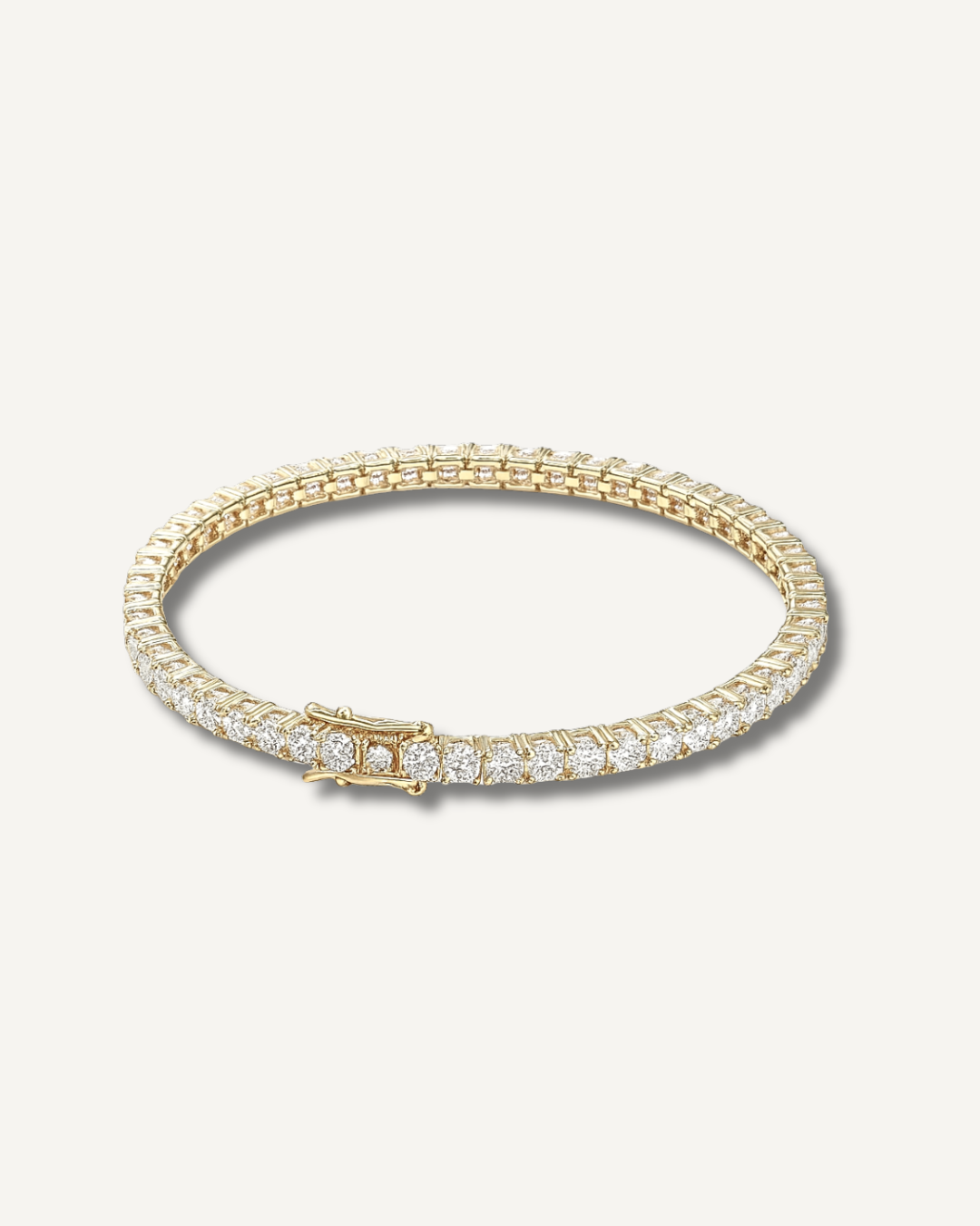 Gold bracelet with diamonds on a white background