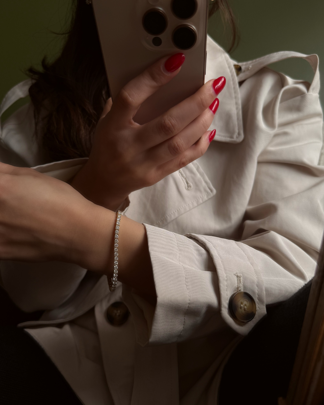 Editorial image of sterling silver lab-grown moissanite tennis bracelet styled with neutral outfit — Kampy