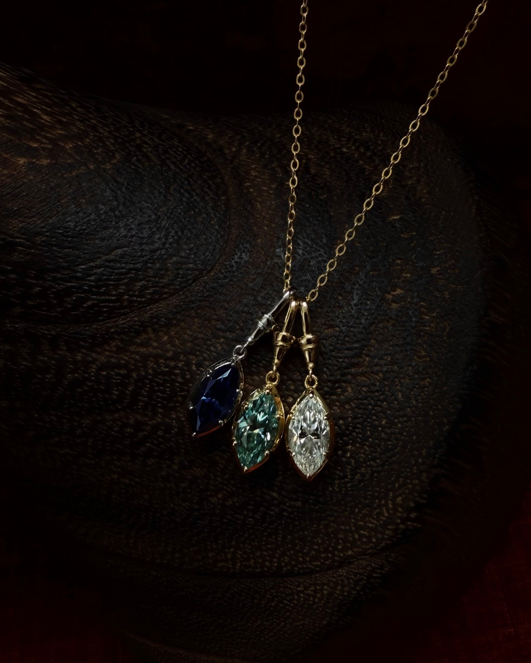 White moissanite marquise necklace styled as a romantic Valentine’s Day gift in gold plated sterling silver by Kampy